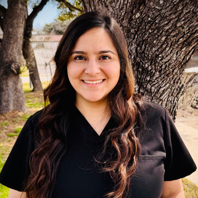 Dr. Lopez outside ChiroCare in San Antonio, TX.
