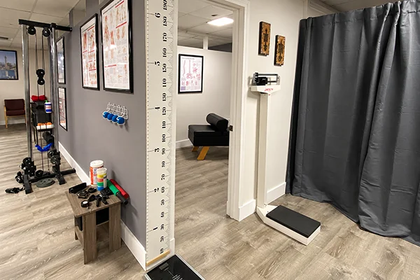 Rehabilitation area at ChiroCare North San Antonio with equipment used for injury recovery.
